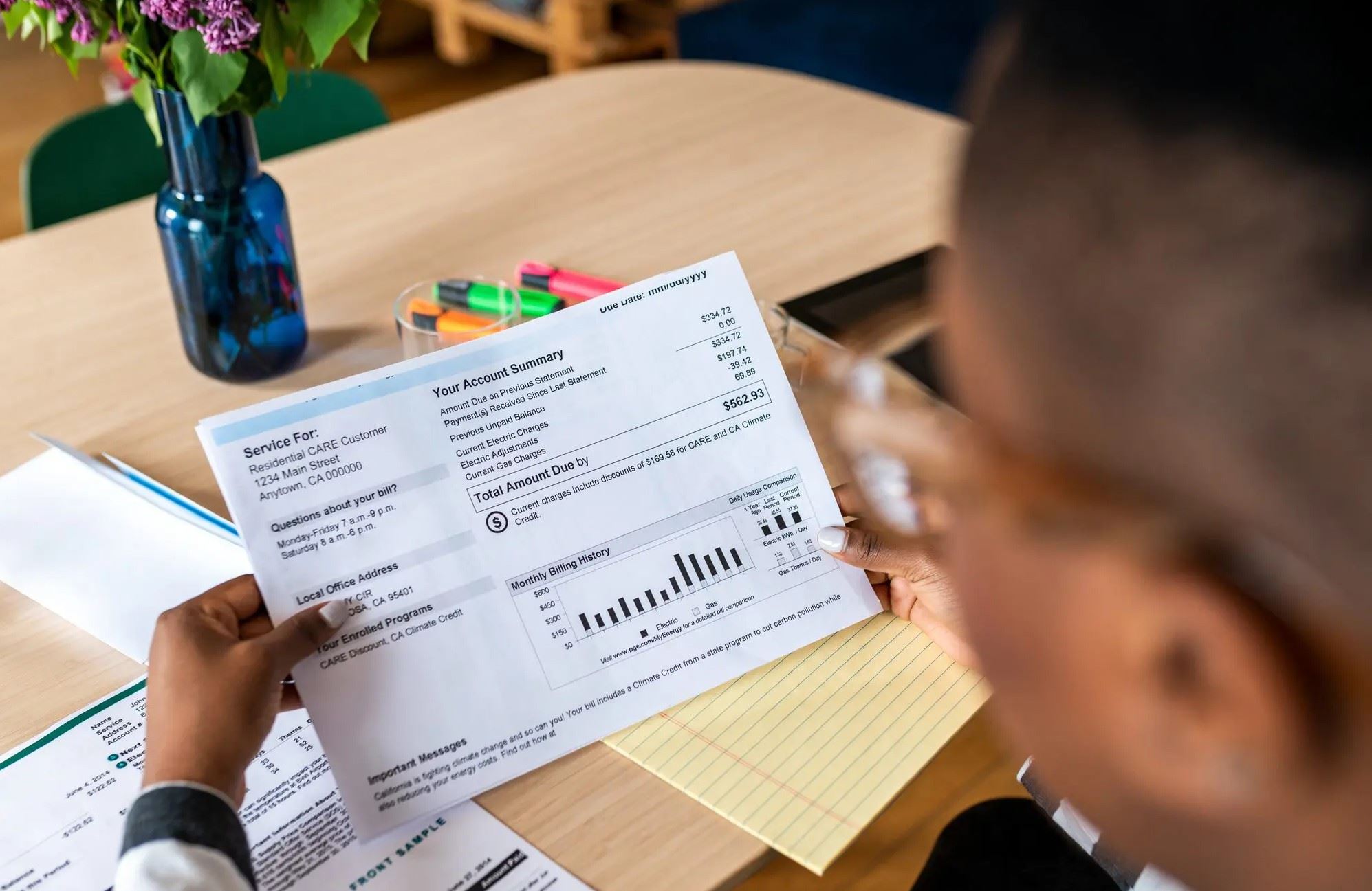 person-looking-at-utility-bill